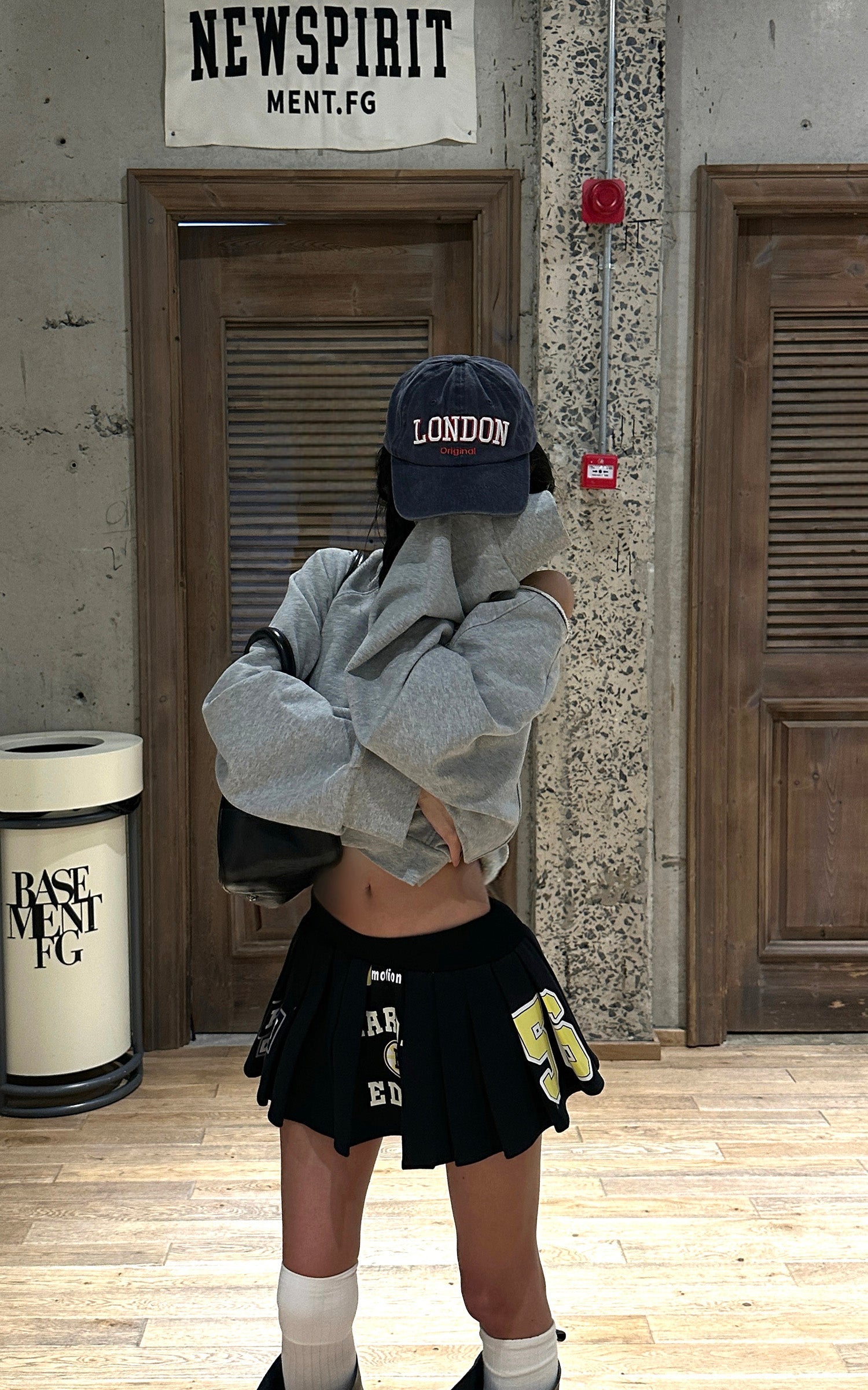 WARDEN EDGE Graphic Pleated Mini Skirt