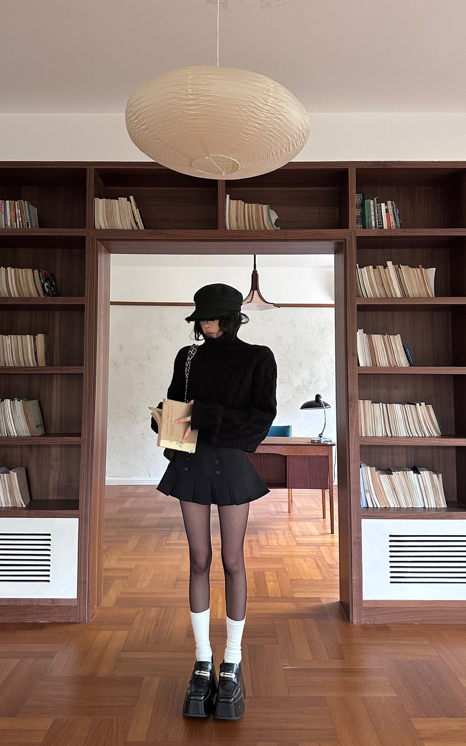 WARDEN EDGE Structured Pleated Mini Skirt with Double-Button Front