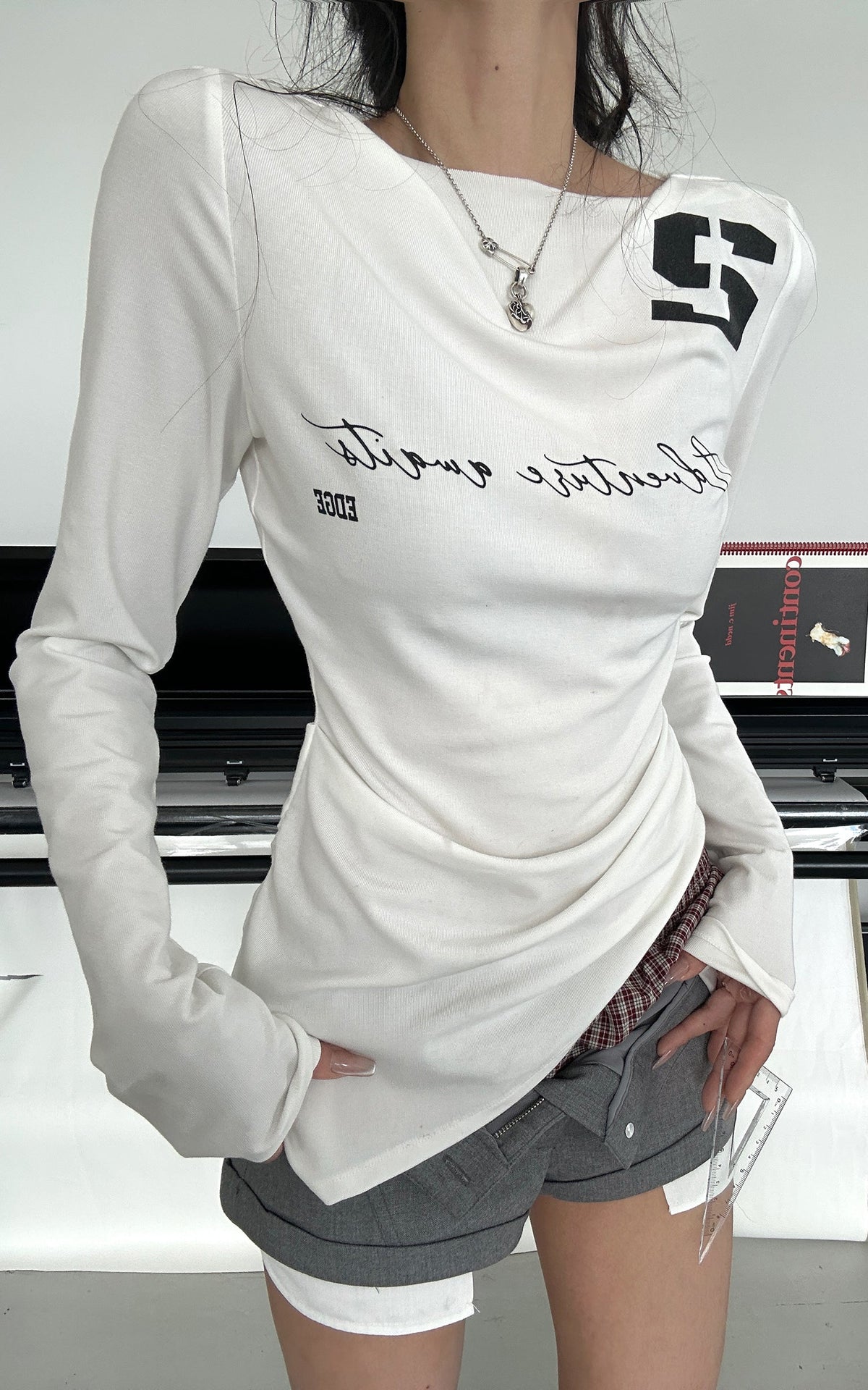 <tc>WARDEN EDGE</tc> Top de manga larga con gráfico Script